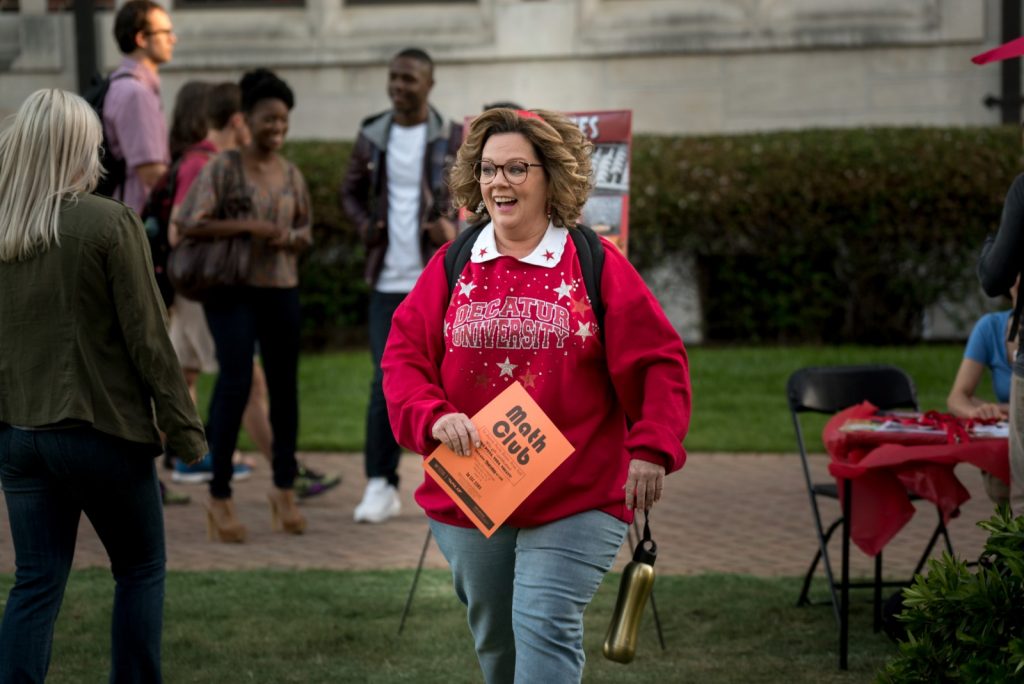 Melissa McCarthy in Life of the Party (2018) walking in red sweatshirt scene