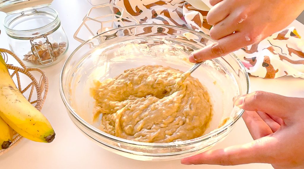 stirring banana bread better in a glass bowl