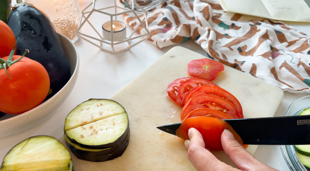 crustless spiral summer vegetables tart with zucchini eggplants and tomato cutting tomatoes