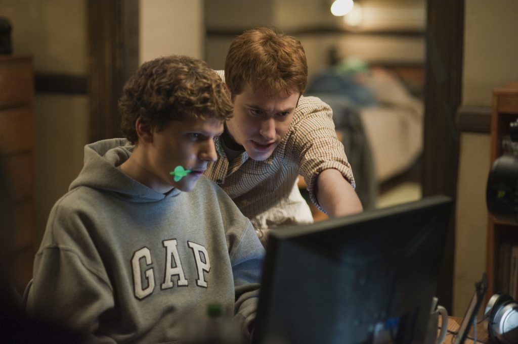 Jesse Eisenberg, left, and Joseph Mazzello  in Columbia Pictures' "The Social Network."